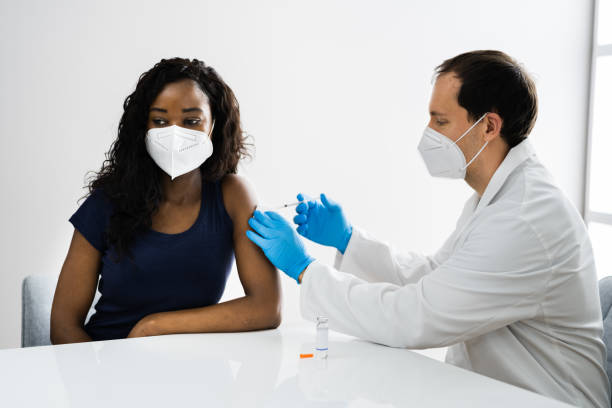 istock African American Patient Getting Covid-19 Vaccine 1297825418