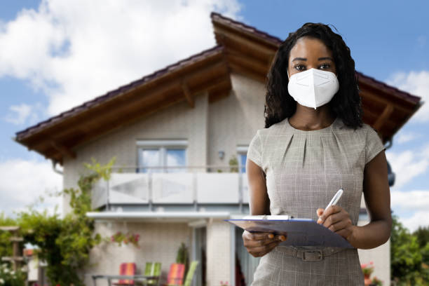 istock Real Estate Appraiser Woman 1297825942