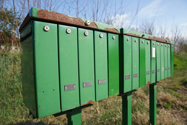 istock Green mailboxes line up along the way. Europe Hungary 1297826475