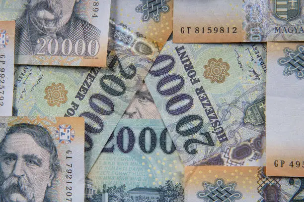 Stack of banknotes as background (Hungarian Forint) 20000 forint banknotes Ferenc Deak close up as a background. Europe Hungary. The all-seeing eye motif.