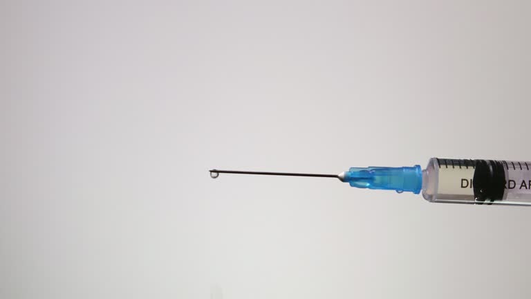 Drug is leaking from a syringe. Free Stock Video Footage Download Clips medical research Drug is leaking from a syringe. Free Stock Video Footage Download Clips medical research