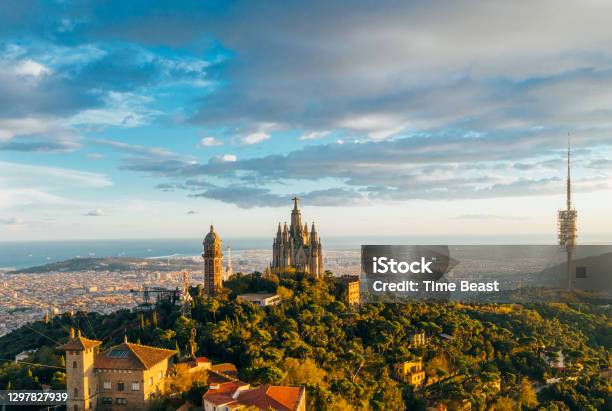 Aerial View Of Barcelona Skyline With Tibidabo Sagrat Cor Temple During Sunset Catalonia Spain Stock Photo - Download Image Now