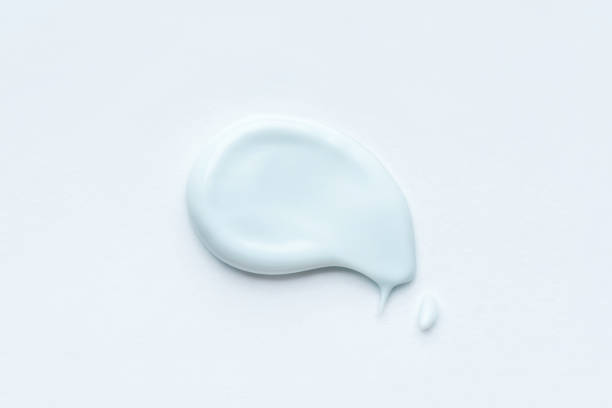 Smear of cosmetic clay on a white background.