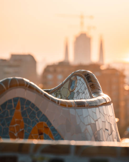 barcelona at sunrise viewed from park guell, barcelona - mosaic tile antonio gaudi art imagens e fotografias de stock