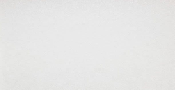istock Abstract Modern white paint cement or concrete wall texture for background. in white light seamless. home wall Paper texture, Empty space. granite panoramic stucco surface background grunge wide. 1297831019