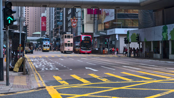 istock Hong Kong city tram and double-decker bus. 1297834187