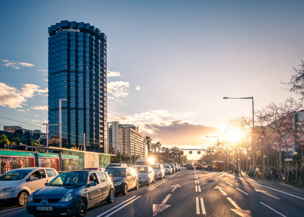 Barcelona, Spain - March 18, 2018: Skyscraper of La Caixa Headquarters complex on Avinguda Diagonal avenue at sunset in Barcelona
