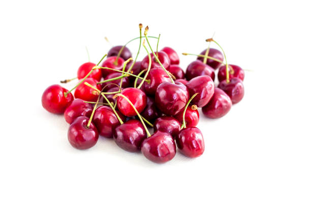 Macro takes a picture of American cherries.