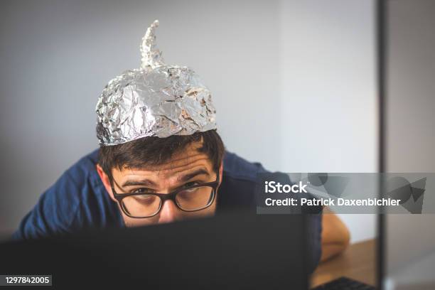 Conspiracy Theory Concept Young Man Is Wearing Aluminum Head Stock Photo - Download Image Now