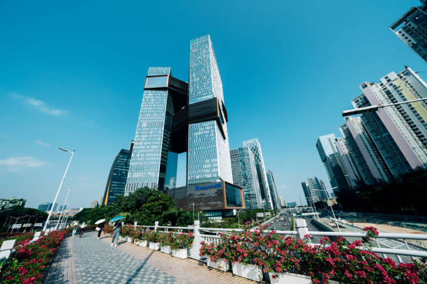Building of Tencent company in Shenzhen, China Shenzhen, China - October 23, 2019: Building of Tencent company - Twin-skyscrapers headquarters located at Shenzhen Bay Start Up Plaza in Nanshan business district. shenzhen technology stock pictures, royalty-free photos & images