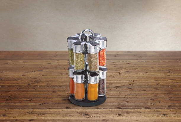 spice rack with bunch of different spices on it spice rack with bunch of different spices on it spice rack stock pictures, royalty-free photos & images
