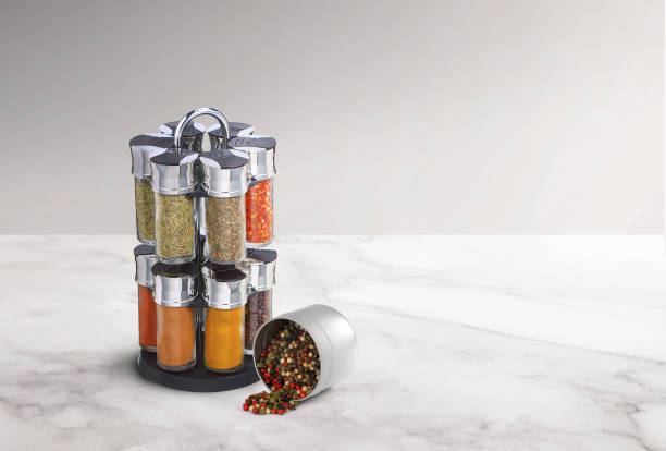 spice rack with bunch of different spices on it spice rack with bunch of different spices on it spice rack stock pictures, royalty-free photos & images