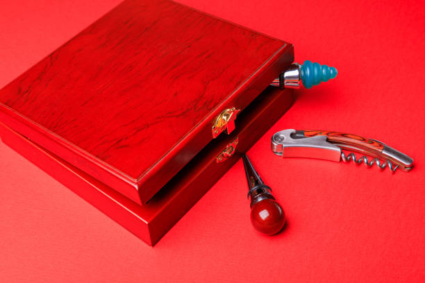 istock Wine corks and bottle openers set in a wooden box. 1297851826