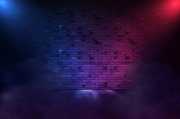 istock Rays neon light in the dark with  smoke. Empty background scene  spotlight. Copy space 1297852791