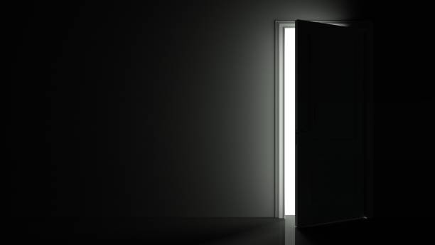 istock Light shines from door opening in dark room. Fills the space with bright white light. 3D render 1297855949