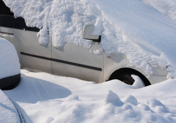 istock A car is covered by white snow 1297856136