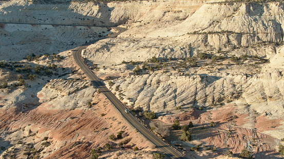 Aerial shot of the stunning and rugged landscape of the Escalante River Basin in Garfield County, Utah. UT-12, also known as Scenic Byway 12 or the \