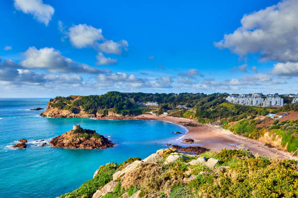 Portelet Bay, Jersey, Channel Islands Image of La Portelet bay with Janvrin's Tomb and beach, Jersey CI. channel islands england stock pictures, royalty-free photos & images