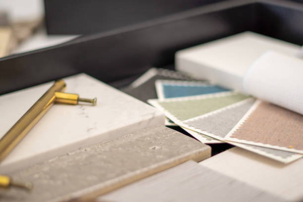 istock Interior designer's working table, an architectural plan of the house, a color palette 1297864126