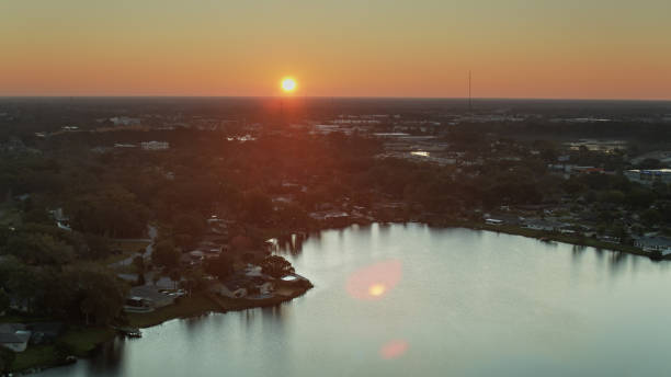 istock Sun Rising Over Orlando Suburbs - Aerial 1297864867