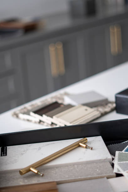 istock Interior designer's working table, an architectural plan of the house, a color palette 1297865077