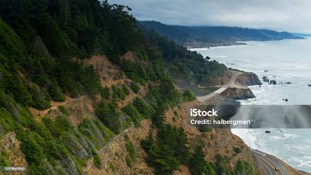 Shoreline Highway Clinging to Cliffs in Mendocino - Aerial Drone shot of the spectacular coastal scenery at Westport, north of Fort Bragg in Mendocino County, California. The beach marks the southerly end of the Lost Coast. Lost Coast Stock Photo
