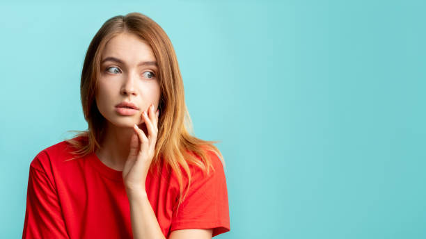 istock skin problem acne treatment worried woman face 1297866807