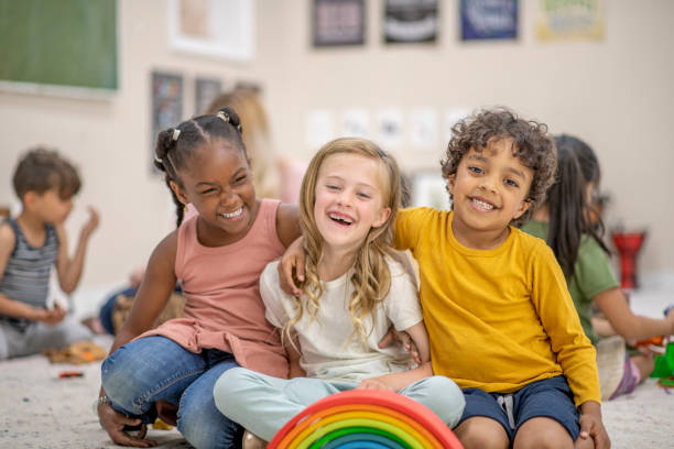istock Cute children in preschool classroom 1297866939