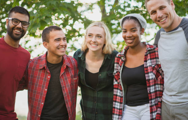 istock Young adults hanging out together 1297866970