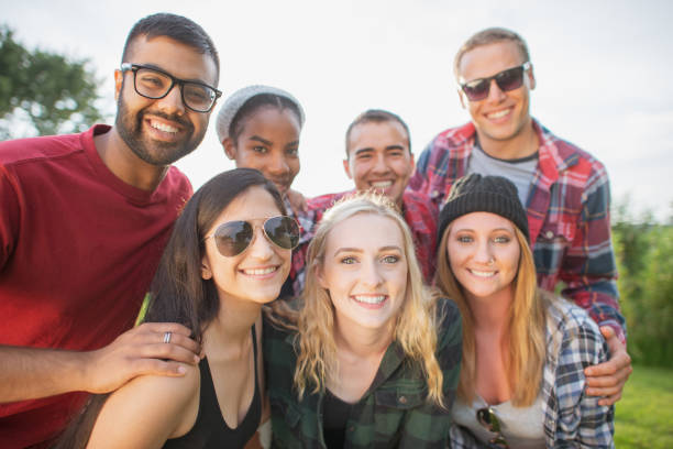 istock Multi ethnic group of young adults outdoors 1297866971
