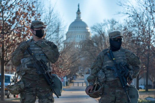 Armed National Guardsmen on security detail at the U.S. Capitol Washington, DC – January 19, 2021:  Armed National Guardsmen on security detail at the U.S. Capitol national guard stock pictures, royalty-free photos & images