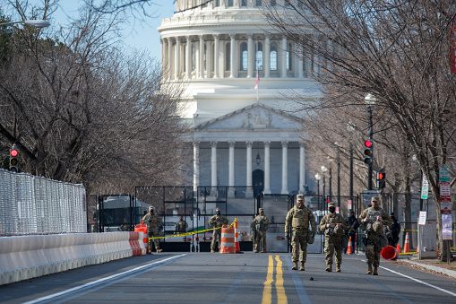 Washington, DC – January 19, 2021: Armed National Guardsmen on security detail at the U.S. Capitol