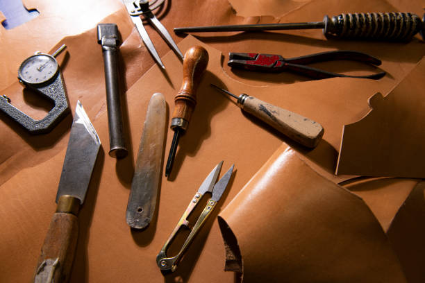 istock many tools of the leather craftsman, 1297871891