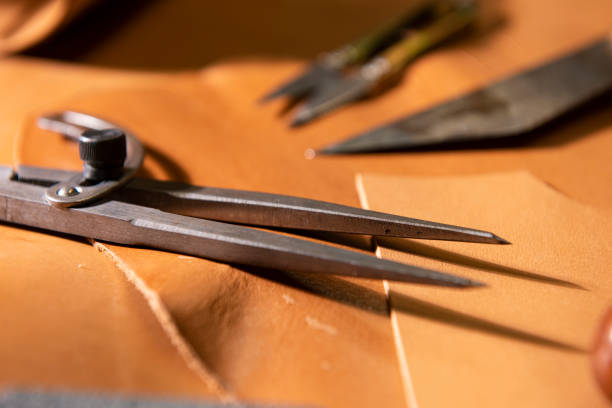 istock many tools of the leather craftsman, 1297873641