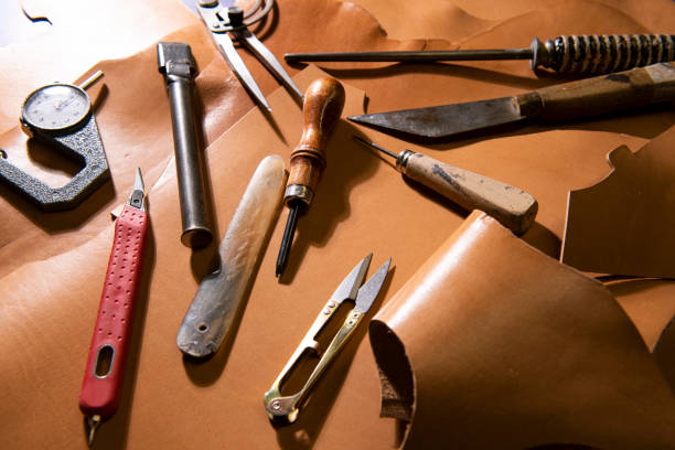 istock many tools of the leather craftsman, 1297873750