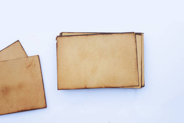 istock Pile of old brown paper for background. 1297878131