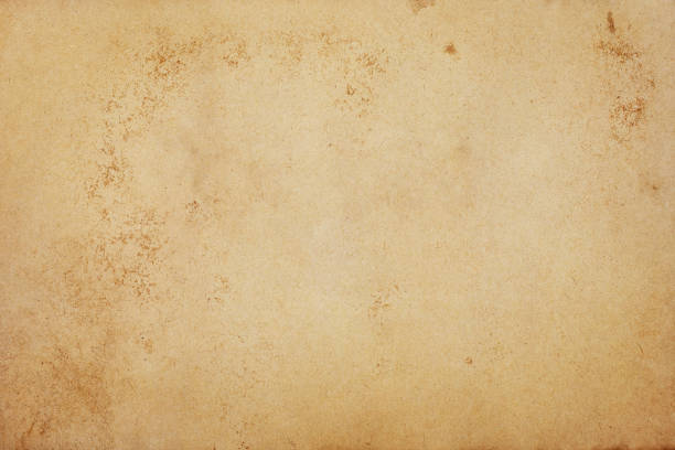 istock Old brown paper grunge background. Abstract liquid coffee color texture. 1297879024