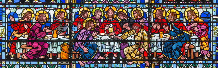 London -  The stained glass of Last Supper the Pantokrator in church St Etheldreda by Joseph Edward Nuttgens.