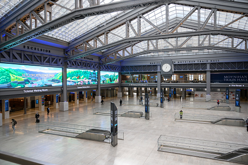 New York, New York, USA - January 22, 2021: The new Moynihan Train Hall in New York City. People can be seen.
