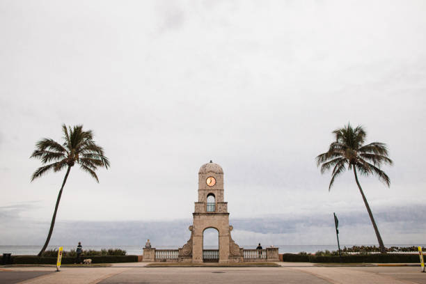istock Cloudy Morning Sunrise Behind the Worth Avenue Clock Tower on Palm Beach, Florida 1297884244