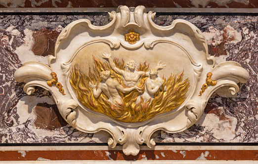 Riva del Garda - The baroque marble relief of the souls in purgatory in church Chiesa di Santa Maria Assunta.