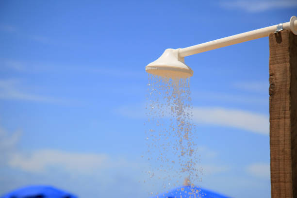 salvador, bahia, brazil - january 21, 2021: plastic shower is seen on the Itapua beach in the city of Salvador.