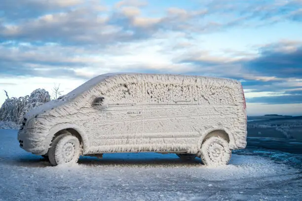 Van covered by ice at Winter - Horafrost