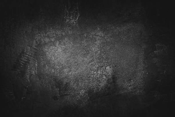 Image of cement wall old black grunge with a rough texture and different decorative patterns.
