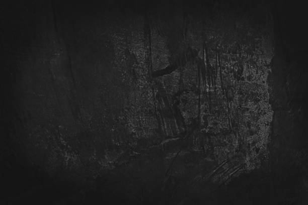istock Image of cement wall old black grunge with a rough texture and different decorative patterns. 1297907267