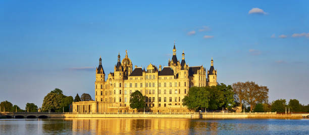 Panorama from Schwerin Castle that is illuminated by natural sunlight. Schwerin, Germany - May 09, 2020: Panorama from Schwerin Castle that is illuminated by natural sunlight. mecklenburg lake district photos stock pictures, royalty-free photos & images