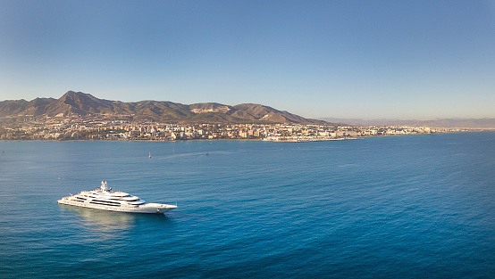 Aerial view of Ocean Victory, Top 10 Super Luxury Yacht owned by Russian Billionaire Viktor Rashnikov with a value of 300 million US, in Mediterranean Sea, Costa del Sol, Malaga, Benalmadena Area.