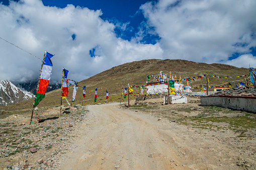 Kunzum Pass, is a high mountain pass in the eastern Kunzum Range of the Himalayas. It connects Lahaul valley and Spiti valley. It is on the route from Gramphoo in Lahaul to Kaza the subdivisional headquarters of Spiti. Kunzum Pass is 122 km (76 mi) from Manali, and 79 km (49 mi) from Kaza