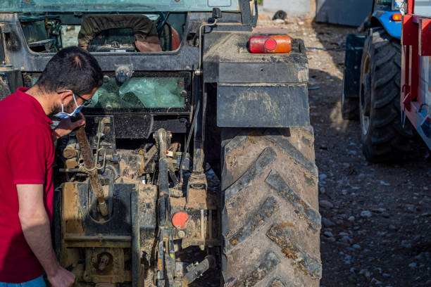 Tracked undercarriage of industrial construction equipment close up. Selective focus.