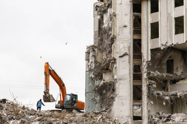 istock Building demolition with special excavator-destroyers 1297927057